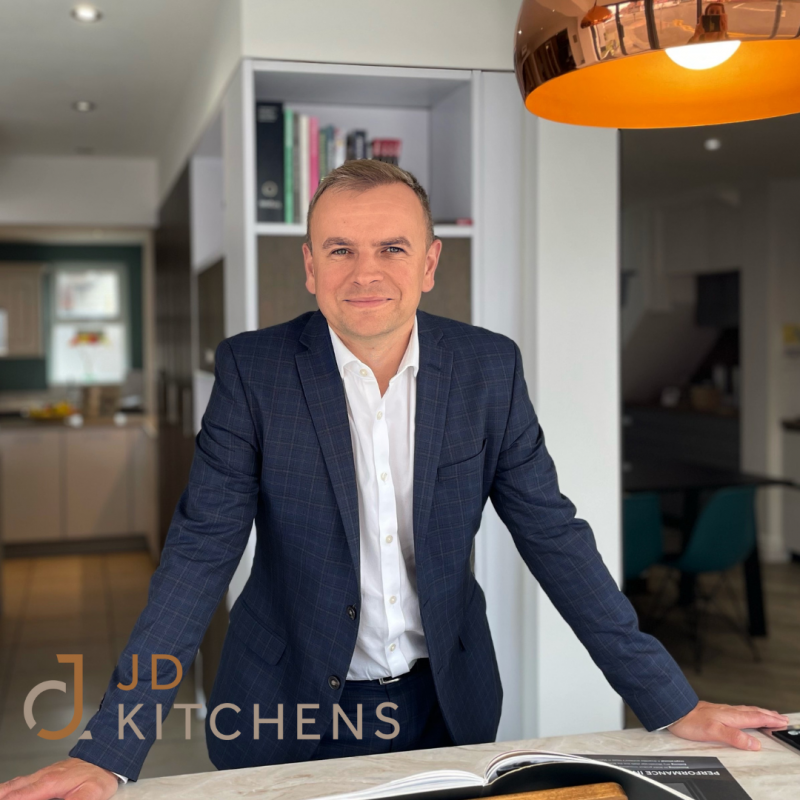 New owner of JD Kitchens inside the showroom